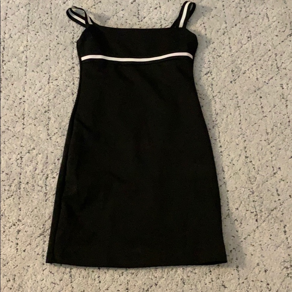 Tight black dress with white stripes